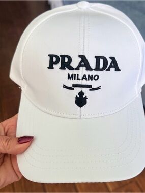 Prada NWT White Re-Nylon Ball 
Cap w/ Embroidered Black signature
Milano logo